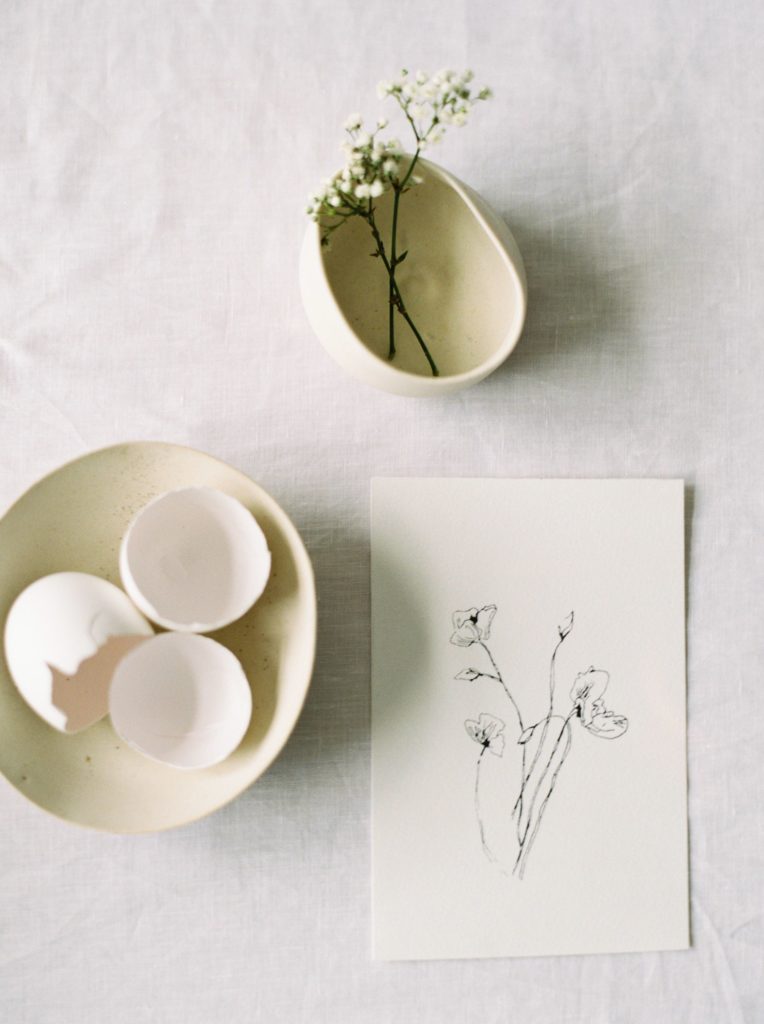 Wedding event planner Vancouver ethereal wedding egg shells and floral sketch flatlay