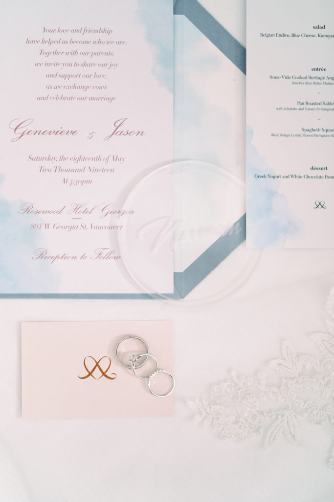 Wedding dusty blue invitation suite, rings, and wedding favor