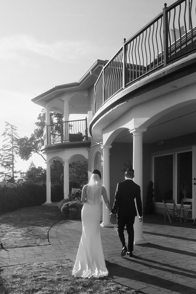 bride and groom walking to villa eyrie
