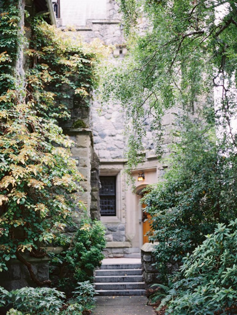 Side entrance with trees and door
