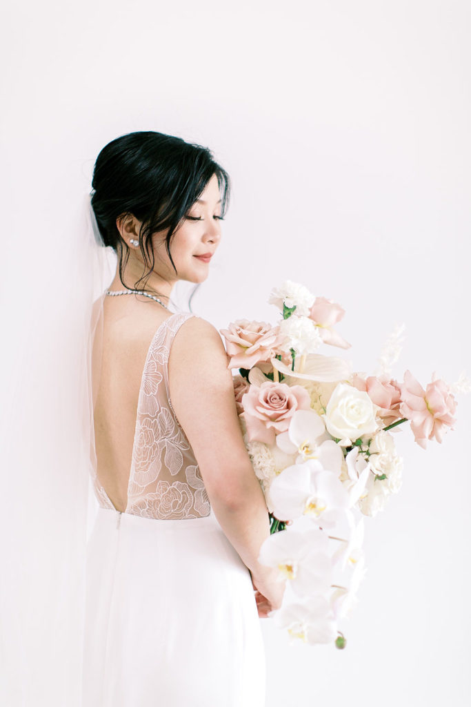 Side view of bride and bouquet