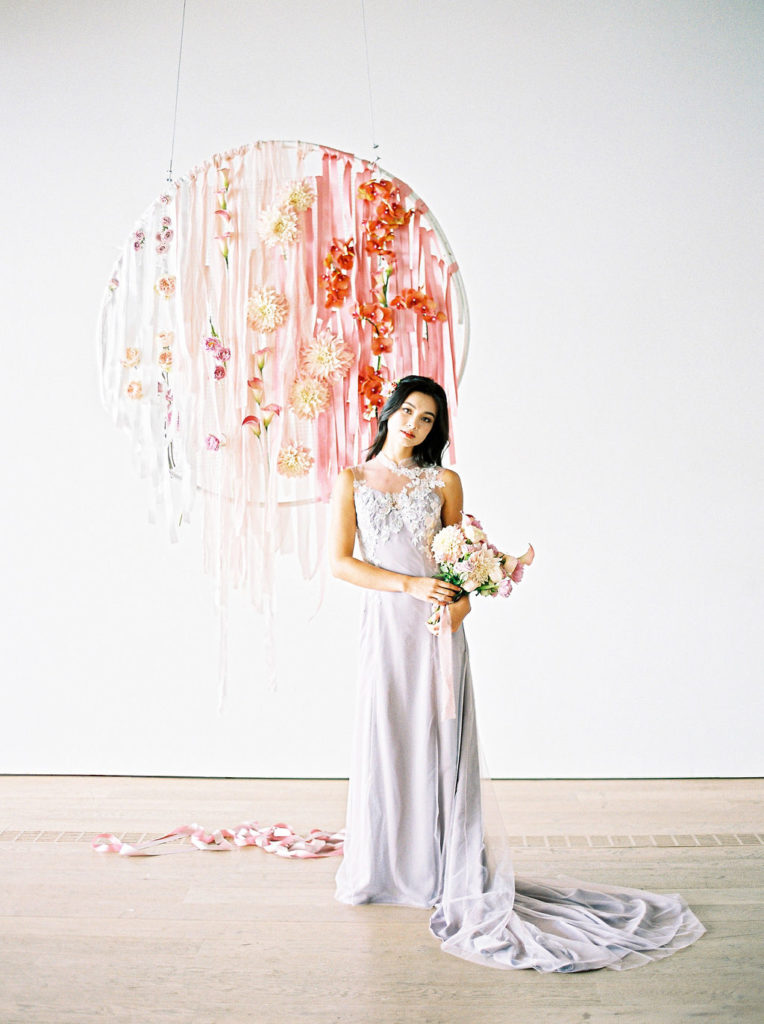 Bride posing in qipao wedding dress