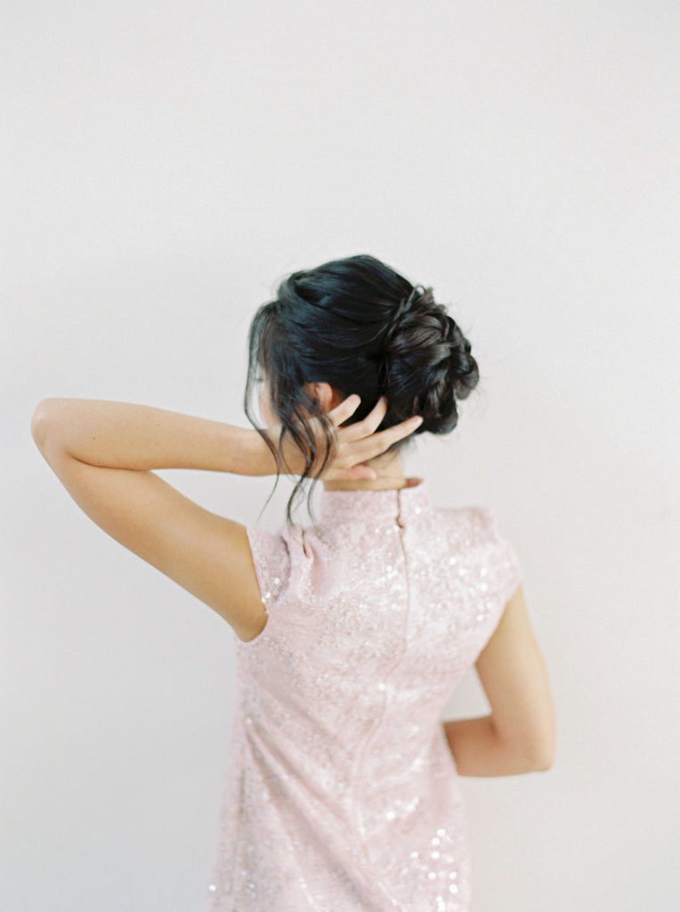 Portrait of the back of qipao dress and bride