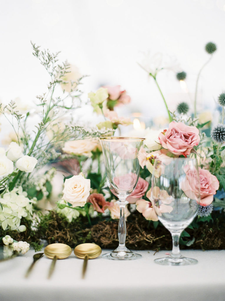 close up of glassware and florals