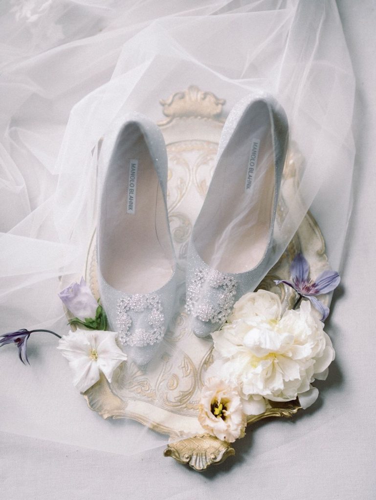 bride's shoes and veil flatlay