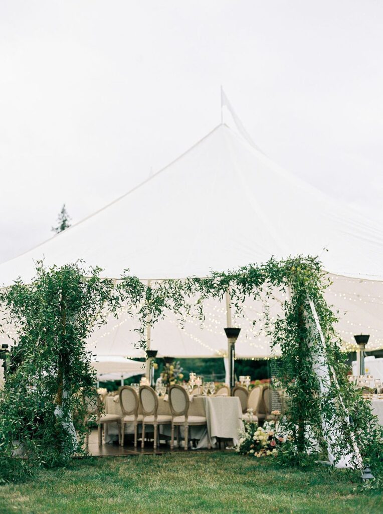 Greenery tent entrance on sailcloth tent