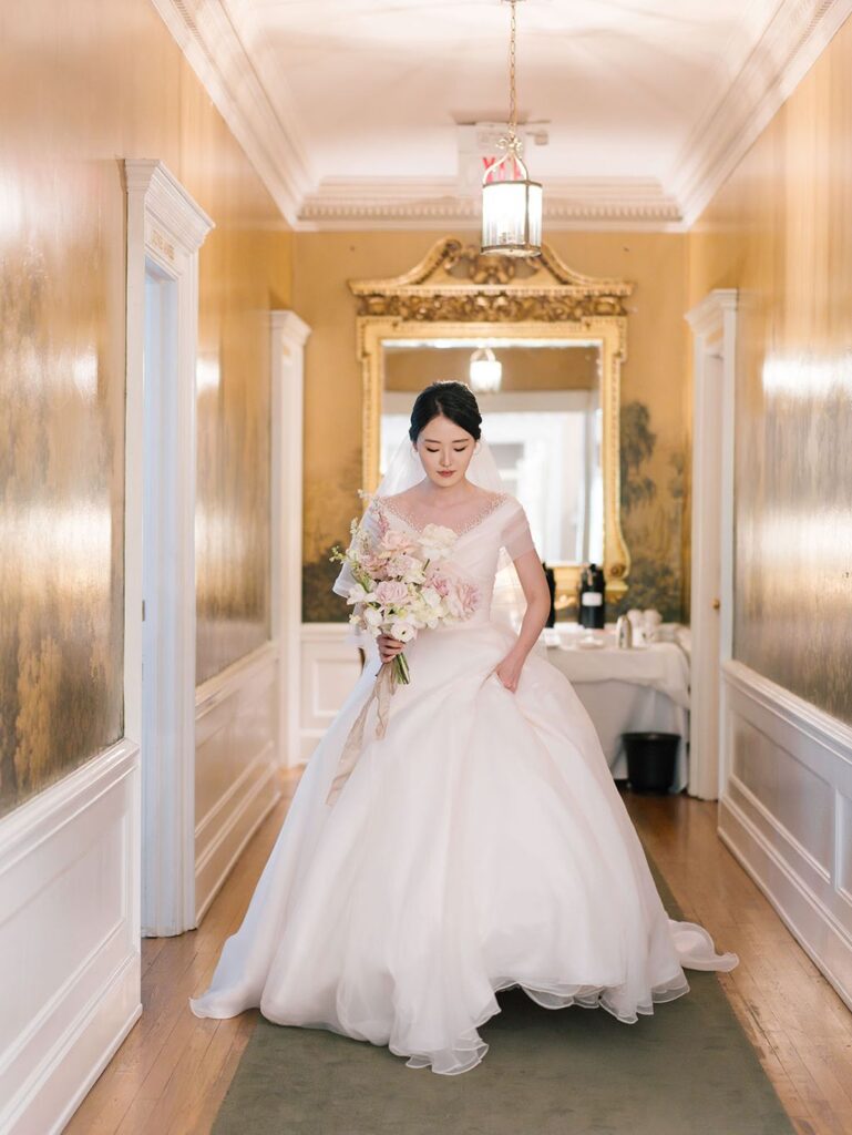 korean bride walking down hallway
