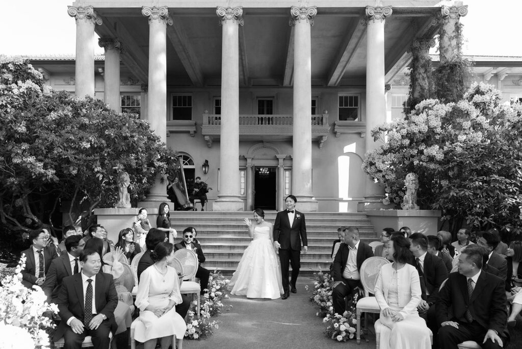 newlyweds at the aisle of hycroft wedding