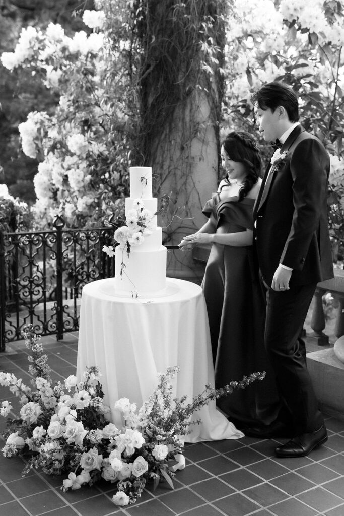 bride and groom cut the wedding cake at Hycroft