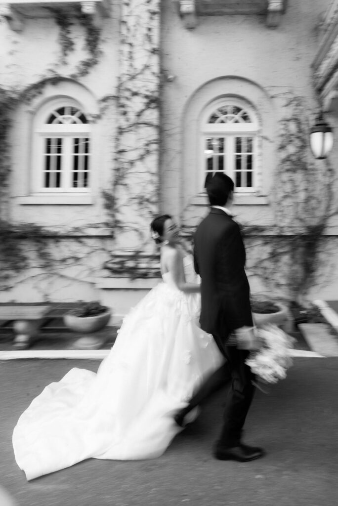 bride and groom walking outside