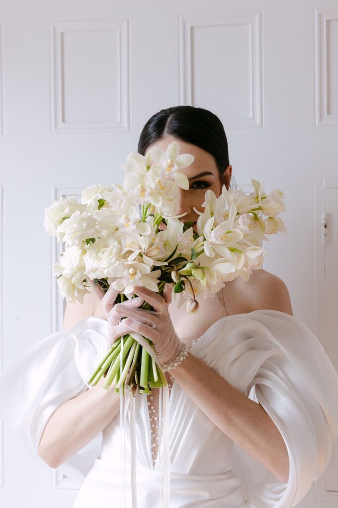 bride holding modern bouquet