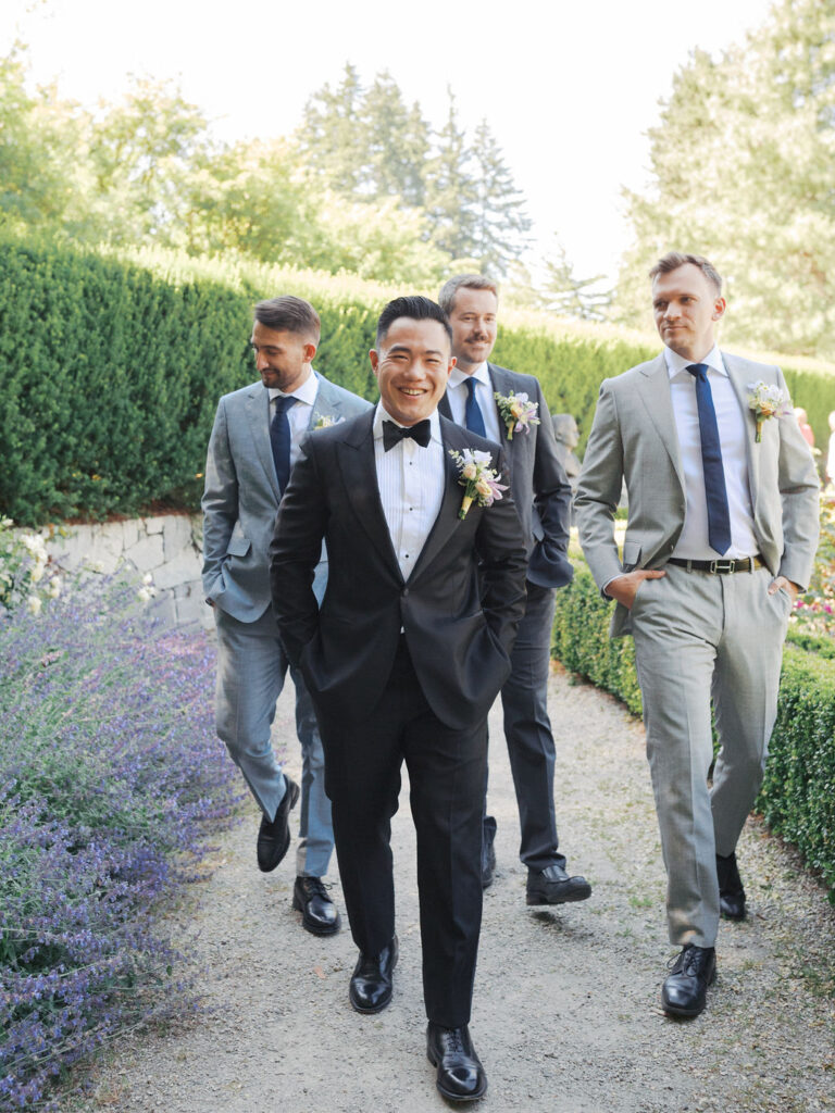 groom and groomsmen walking