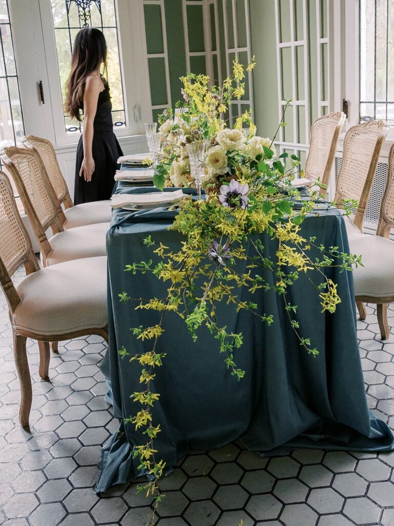 lady in wearing black dress near engagement table