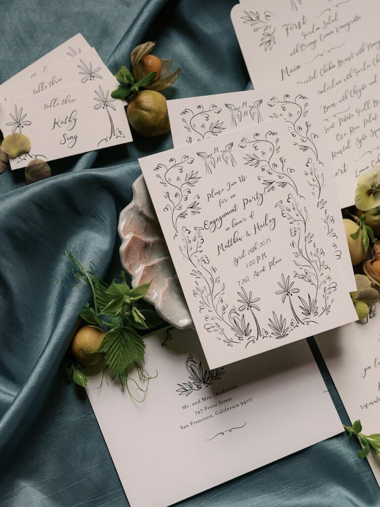 flatlay of Vancouver engagement party invitations