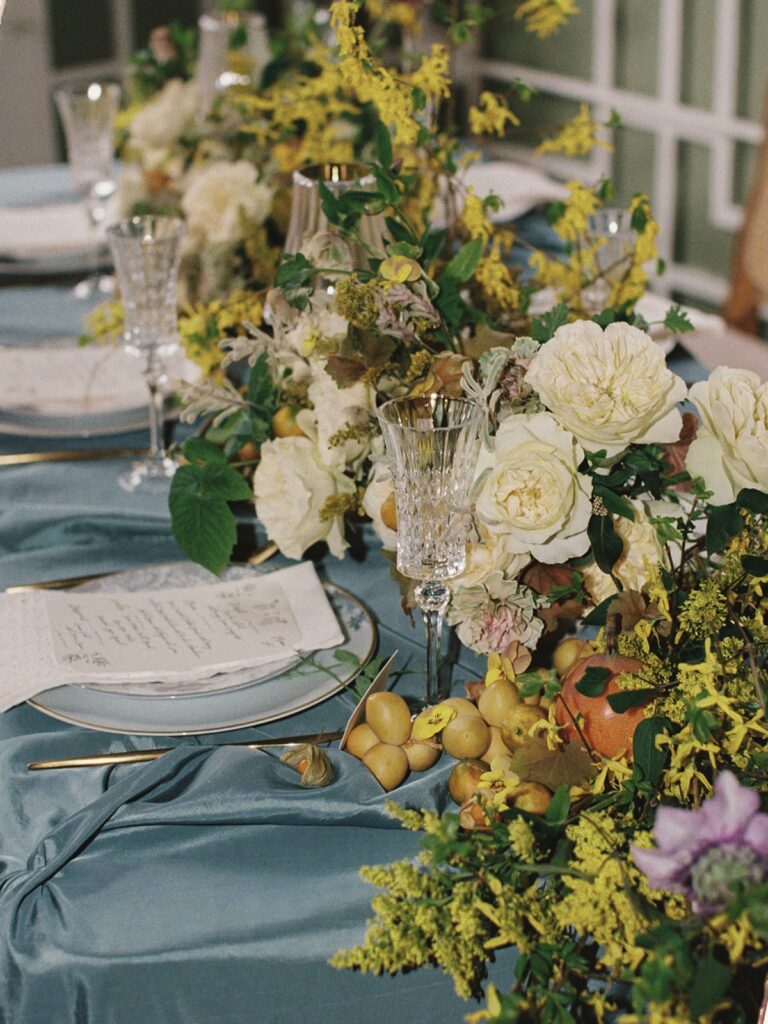 David Austin roses with plates and menus