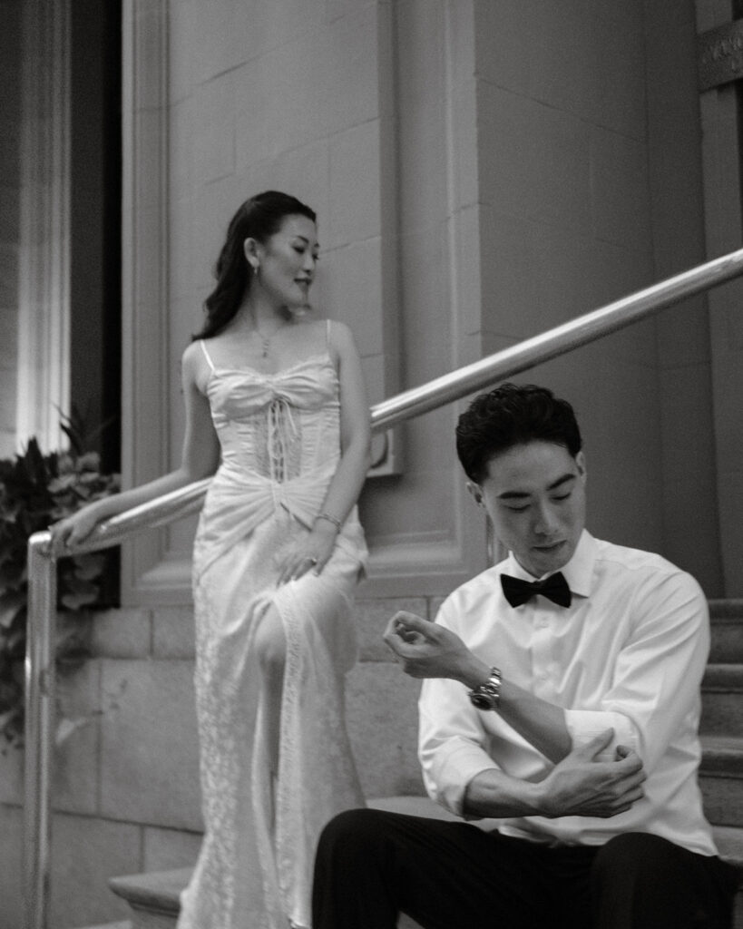 Couple posing in front of Vancouver Club