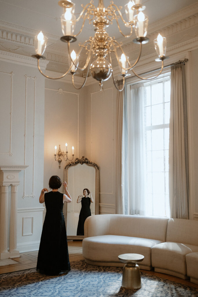 Groom's mom checking reflection