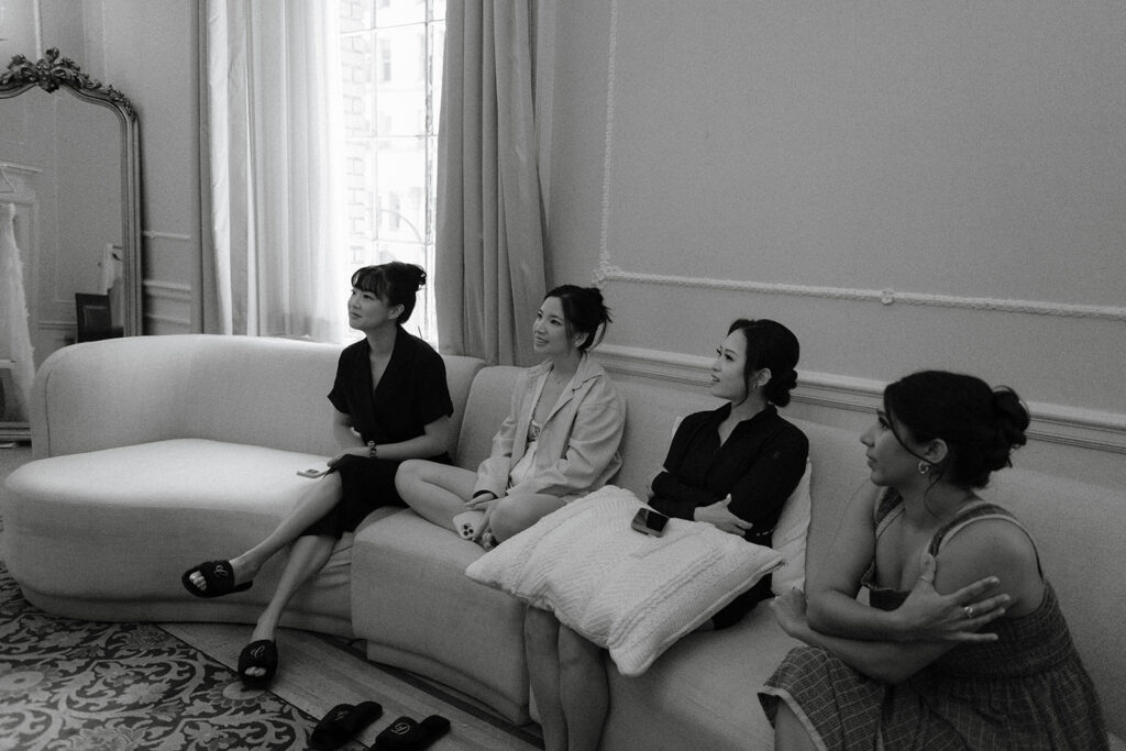 Bridesmaids waiting on sofa in Georgian Room