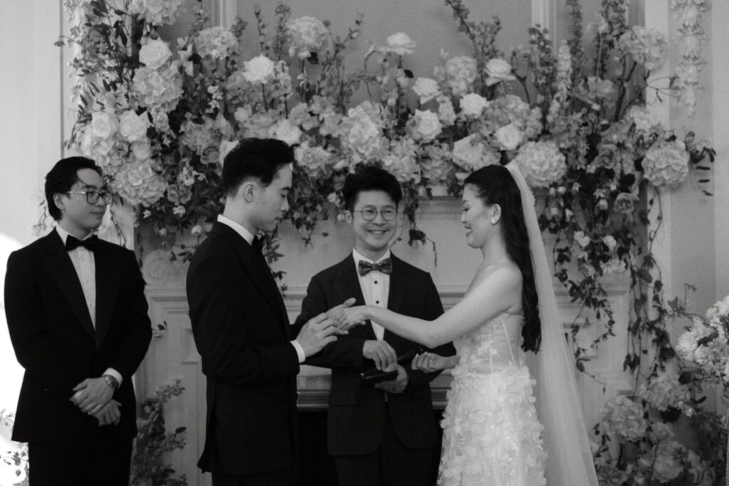 Wedding couple exchanging rings at Vancouver Club