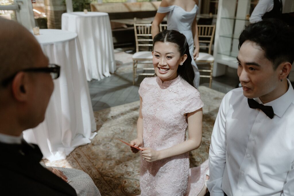 bride smiling at tea ceremony