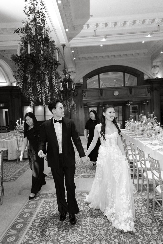 bride and groom reception reveal with wedding planners